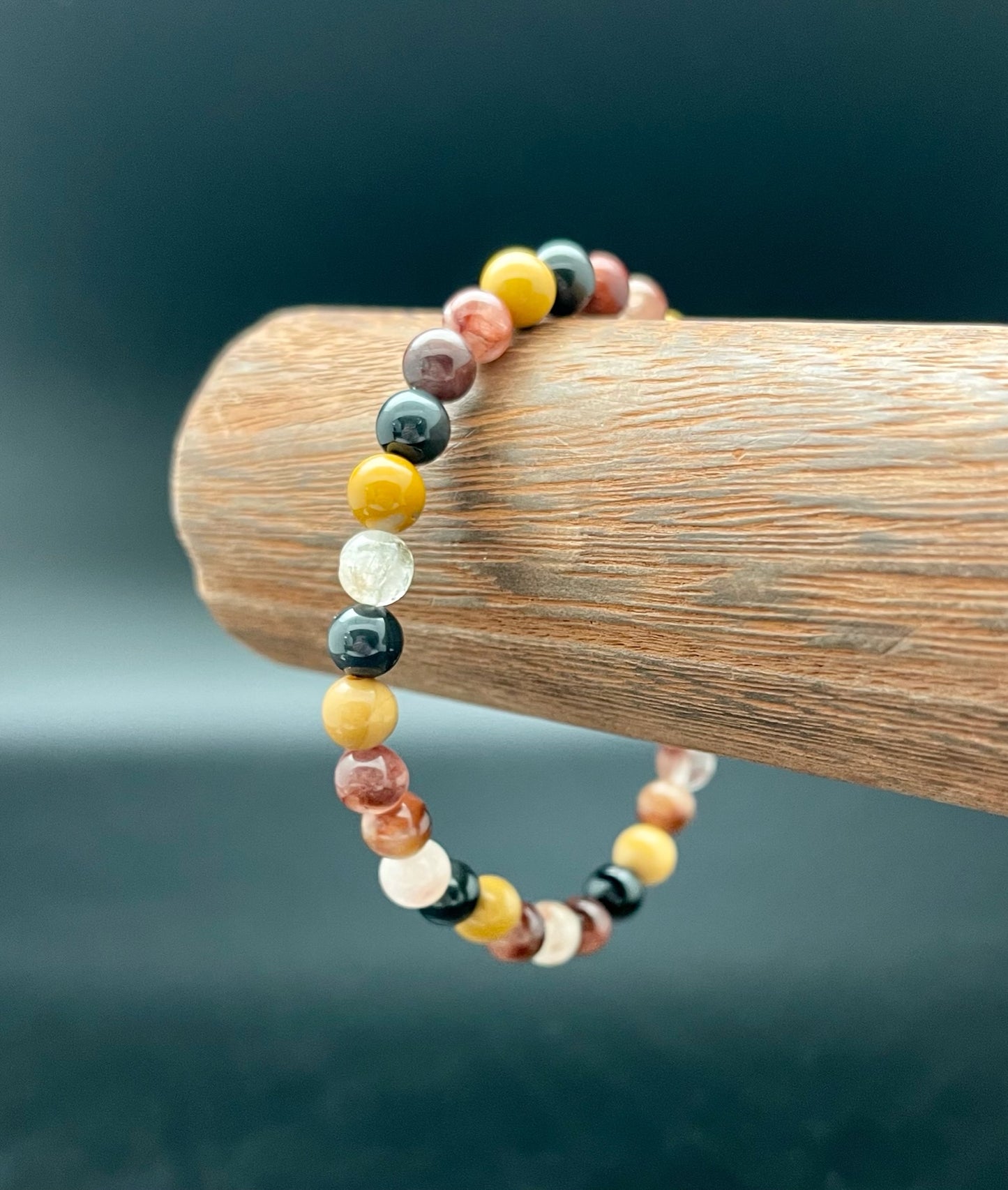 Rutile Quartz, Silver Obsidian, and Mookiate Bracelet