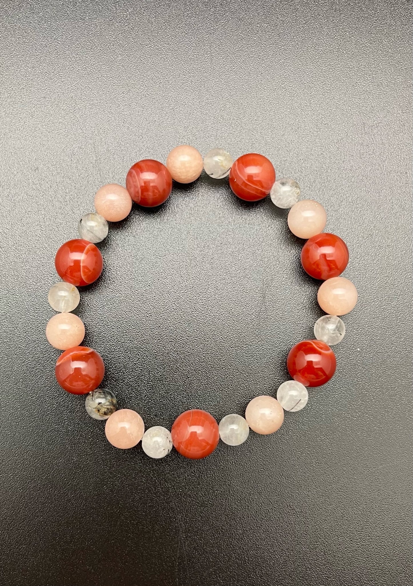 Red Sardonyx, Tourmalated Quartz, and Peach Moonstone Bracelet